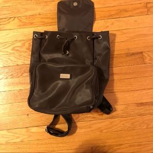 Kenneth Cole Reaction Weatherproof backpack with matching crossbody purse